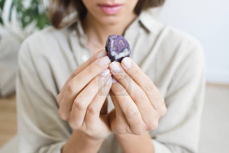 Photo for Woman Holding Stone Healing Crystal - Royalty Free Image