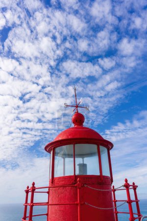 Foto de Bright red lighthouse in Nazare close up - Imagen libre de derechos