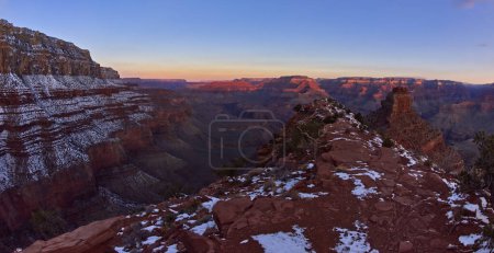 Photo for Sunrise view from Cedar Ridge along the South Kaibab Trail at Grand Canyon Arizona in winter. Pipe Creek Canyon is on the lower left and O'Neill Butte is just right of center beyond the ridge. - Royalty Free Image