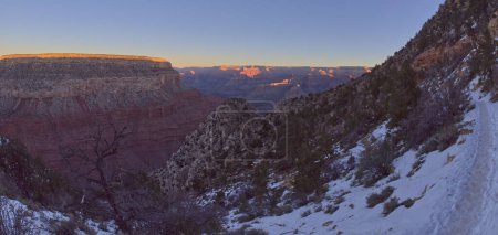 Photo for View of Yuma Point at sunrise from Hermit Trail in winter at Grand Canyon Arizona. - Royalty Free Image