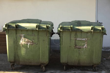 Photo for Green garbage cans. Containers for waste on street. - Royalty Free Image