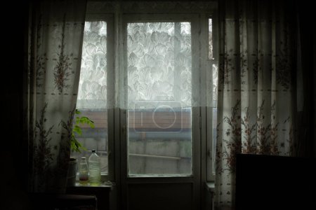 Foto de Window in room. Curtains on window. Details of interior of old apartment in Russia. - Imagen libre de derechos