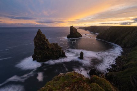 Photo for Colorful sunset over Duncansby stacks, Duncansby head, Scotland - Royalty Free Image