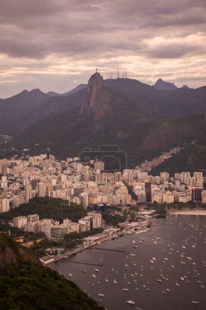 Téléchargez les photos : Beautiful view to city buildings, mountains and rainforest seen from Sugar Loaf, Rio de Janeiro, Brazil - en image libre de droit