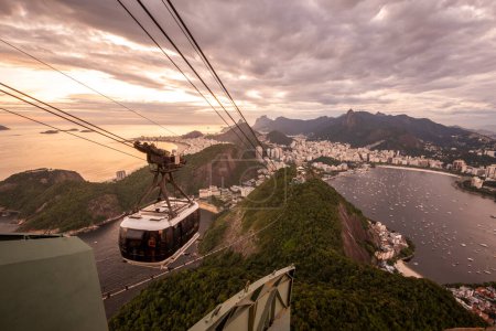 Photo for Beautiful view to cable car, ocean and city from Sugar Loaf Mountain, Rio de Janeiro, Brazil - Royalty Free Image