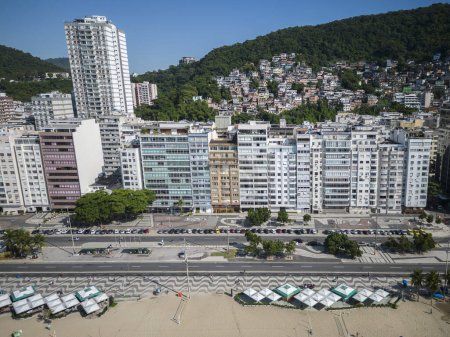 Téléchargez les photos : Beautiful aerial view to Copacabana beach and buildings on sunny day, Rio de Janeiro, Brazil - en image libre de droit