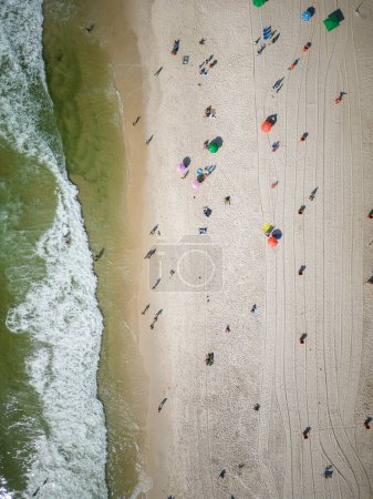 Téléchargez les photos : Beautiful top down view to Copacabana beach with water and beach umbrellas on the sand, Rio de Janeiro, Brazil - en image libre de droit