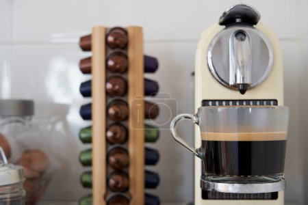 Photo for Homemade coffee corner with a Nespresso and a black coffee - Royalty Free Image