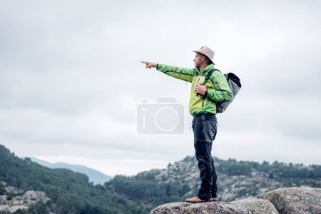 Photo for Man spending an autumn day in the mountains - Royalty Free Image