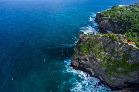 Photo for Uluwatu temple sitting on the cliff in South Bali Indonesia - Royalty Free Image