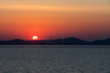 Téléchargez les photos : Sunset from the Great Door in Naxos, Greece - en image libre de droit