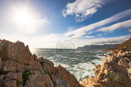 Téléchargez les photos : Seascape scene at the end of Gordons bay with mountain views - en image libre de droit