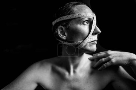 Photo for Portrait of a strong woman contemplating how she measures up - Royalty Free Image
