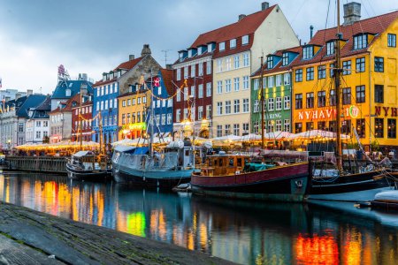 Photo for Houses and boats of nyhavn street in copenhagen - Royalty Free Image