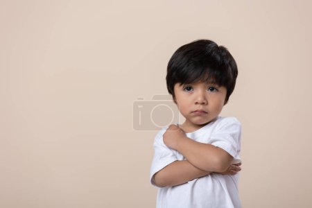 Photo for Scolded or sad little Mexican boy, sad expression - Royalty Free Image