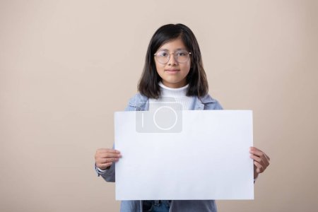 Photo for Mexican young girl holding poster, international woman's day - Royalty Free Image