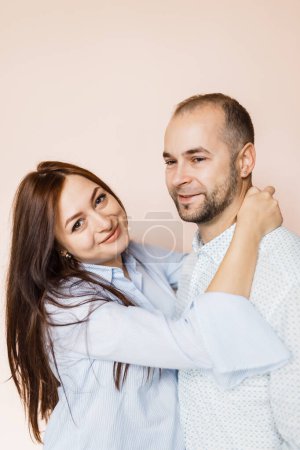 Photo for Man and a woman in love pose for a family portrait - Royalty Free Image