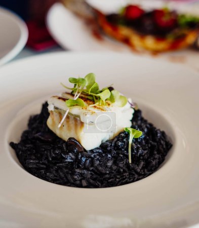 Photo for Black rice with cuttlefish and squid ink - Royalty Free Image