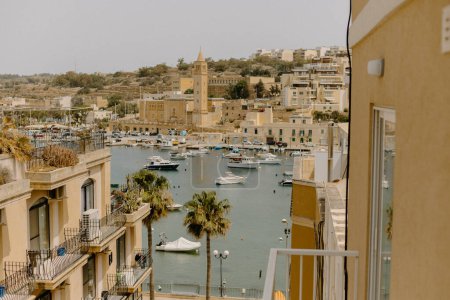 Photo for Warm view of a port in a fishing village in Malta - Royalty Free Image