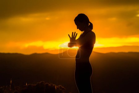 Foto de Carbondale Colorado Yoga Poses at Sunset - Imagen libre de derechos