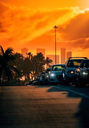 Photo for Sunset road miami usa florida skyscrapers lights cars traffic - Royalty Free Image