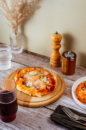Photo for Homemade pizza with sausages, cheese and vegetables - Royalty Free Image