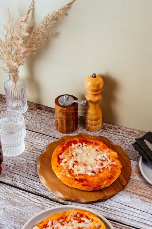 Photo for Homemade pizza with ham and cheese. - Royalty Free Image