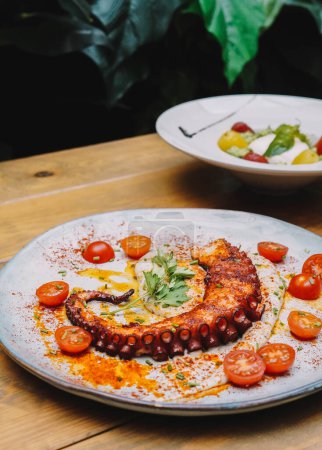 Foto de Pulpo tentáculo gourmet que sirve en un restaurante francés - Imagen libre de derechos