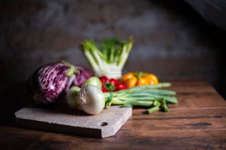 Photo for Composition of vegetables with cutting board - Royalty Free Image