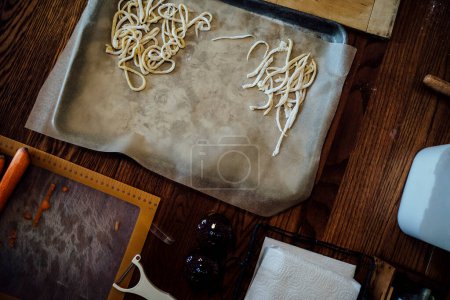 Photo for View from Above of Homemade Pasta on Kitchen Table - Royalty Free Image