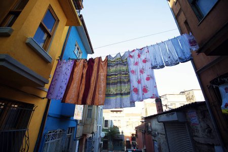 Foto de Hanging laundry to dry on the windows of houses in Balat district. - Imagen libre de derechos