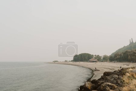 The beach at Golden Gardens Park engulfed in wildfire smoke