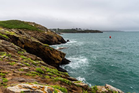 Photo for Scenic view of cliffs and sea against cloudy sky. Pointe Saint Mathieu, Brittany, France - Royalty Free Image
