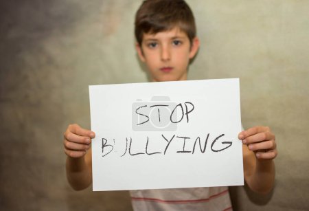 Photo for Stop bullying, sad kid, social problems of humanity - Royalty Free Image