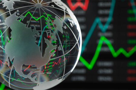 Financial Markets, Globe of US with data and graphs reflecting.