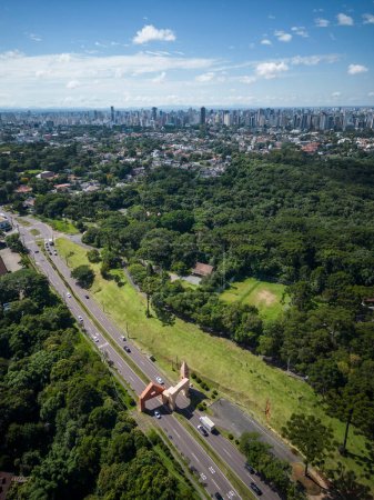 Photo for Beautiful view to orange Santa Felicidade city portal over road in green area, Curitiba, capital of Paran, Brazil - Royalty Free Image