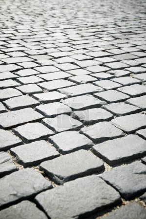 Téléchargez les photos : Plancher d'une rue avec des carreaux de pierre. - en image libre de droit