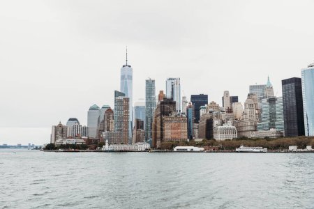 Photo for View of buildings of the New York City skyline taken from the water. - Royalty Free Image