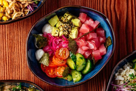 Photo for Hawaiian poke bowl with tuna, vegetables, rice - Royalty Free Image