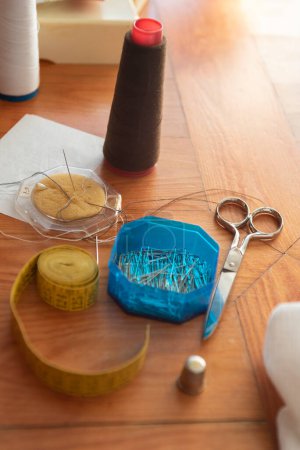 Photo for Sewing garment and sewing utensils - Royalty Free Image