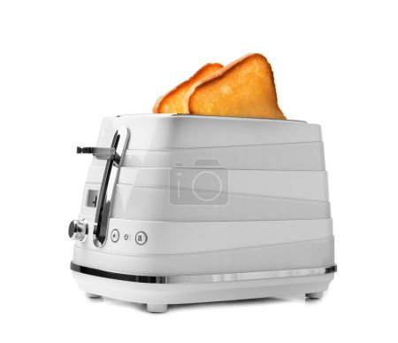 Photo for Toaster with slices of bread. Fried bread in a toaster. Appliances for the kitchen. Modern toaster on a white background. - Royalty Free Image