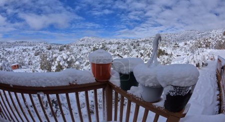 Photo for Snow covered flower pots on a winter morning in Chino Valley Arizona. Taken in March of 2023. - Royalty Free Image