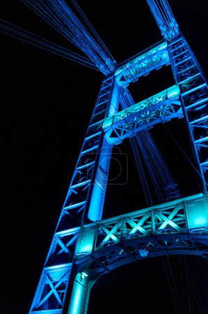 Photo for Illuminated suspension bridge of the city of Santa Fe, Argentina. - Royalty Free Image