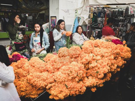 Photo for Sellers of cempasuchil flowers in the Public Market of Mexico. - Royalty Free Image