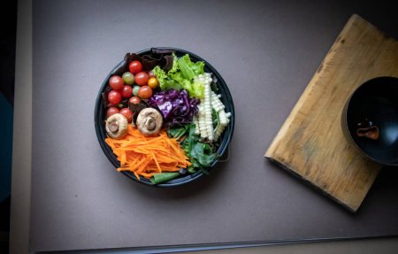 Photo for Colored salad in bento box with dark background - Royalty Free Image