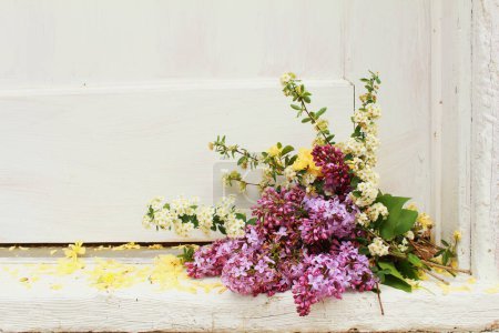 Photo for Flower Bundle on Door Way - Royalty Free Image