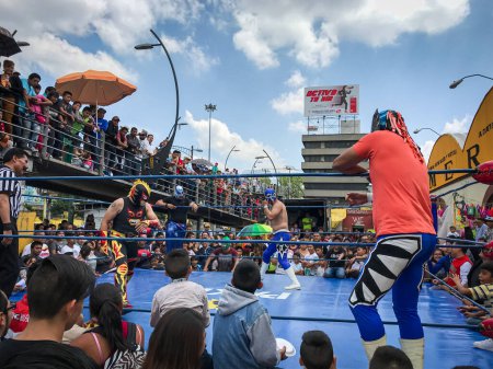 Photo for Mexican wrestling casual walking on esplanade public market in Mexico. - Royalty Free Image