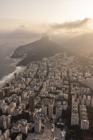 Photo for Beautiful aerial view to mountains and city buildings in Leblon Beach, Rio de Janeiro, Brazil - Royalty Free Image