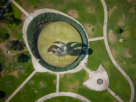 Photo for Beautiful aerial view to green urban park with iron flower Floralis Generica in Buenos Aires, Argentina - Royalty Free Image
