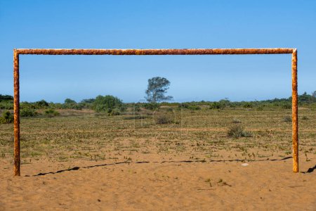 Photo for Rusty goalposts in the field - Royalty Free Image
